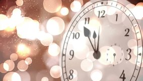 Animation of clock showing midnight and fireworks exploding with spots of light background. New year, new year's eve, party, celebration and tradition concept digitally generated video.