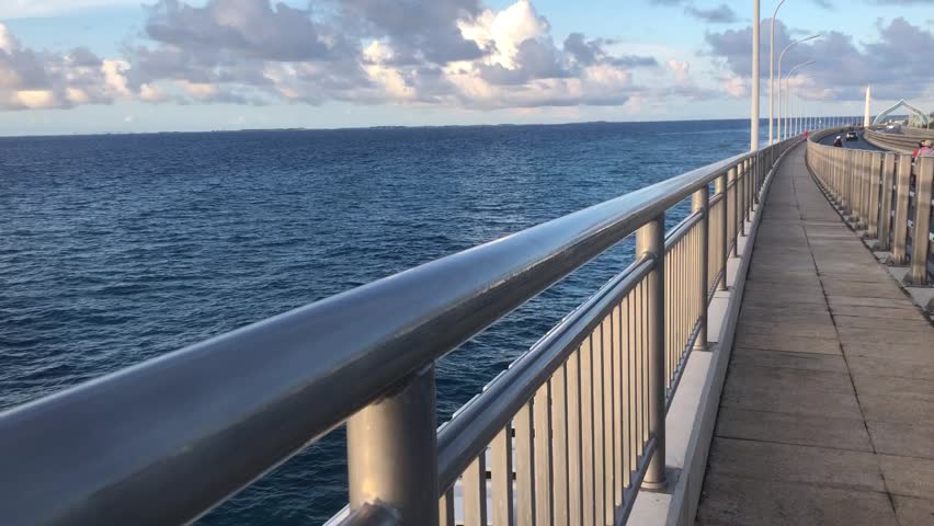 Morning jogging view from velana airport edge to male city in a morning.