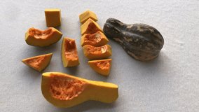 cut raw fresh pumpkin squash for Asian recipes