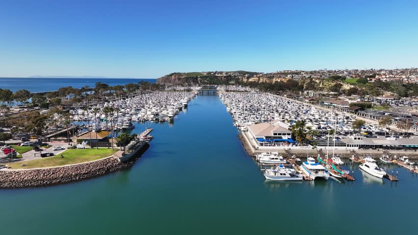 Boats Moored At Dana Point Harbor With Yacht Club And Restaurant In California, USA. - aerial shot Royalty-Free Stock Footage #1112057763