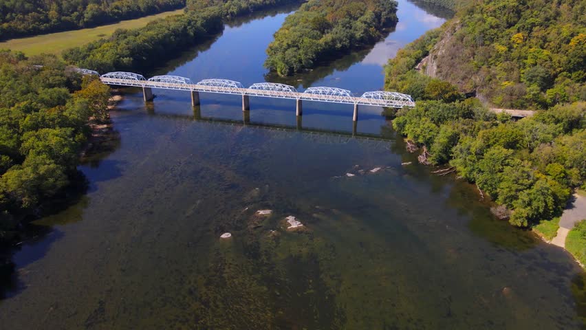 Transport bridge over the Potomac River on the border of Virginia and Maryland. Aerial view of nature and traffic
