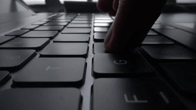 A program coder is typing on laptop keyboard close up macro. Hacker is using computer. Man hands are searching in web or working on pc. Concept of digital cyber security and vpn data protection - Powered by Shutterstock - Get 15% off with code: PIKWIZARD15
