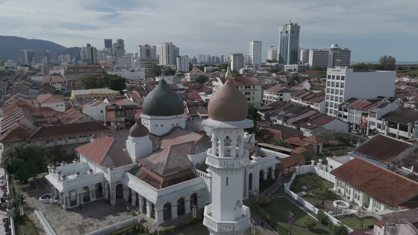 Aerial video of the Mosque of Kapitan Keling , Penang, Malaysia