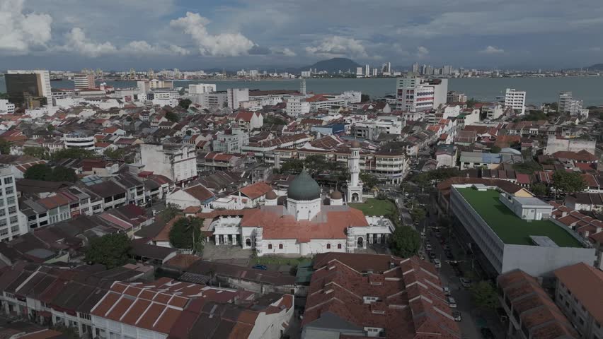 Aerial video of the Mosque of Kapitan Keling , Penang, Malaysia
