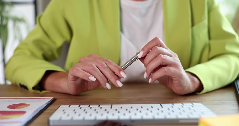 Businesswoman knocking with pen on hands and getting nervous closeup 4k movie slow motion. Making important business decisions concept | Shutterstock HD Video #1112085219