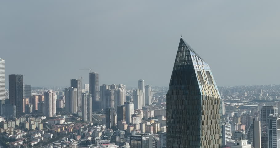Cinematic aerial view of city skyline modern business financial skyscrapers building and shopping mall of Istanbul Turkey
