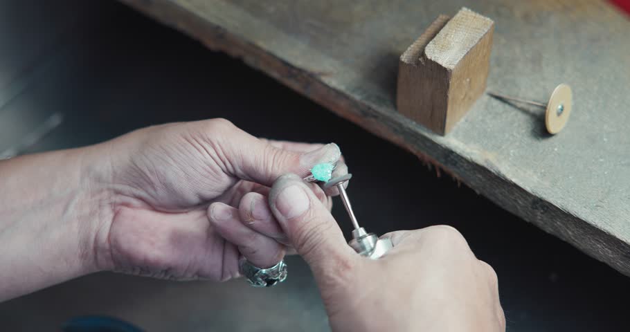 Jeweler in the process of hand-making a blue quartz jewelry ring at jewlery workshop | Shutterstock HD Video #1112090069