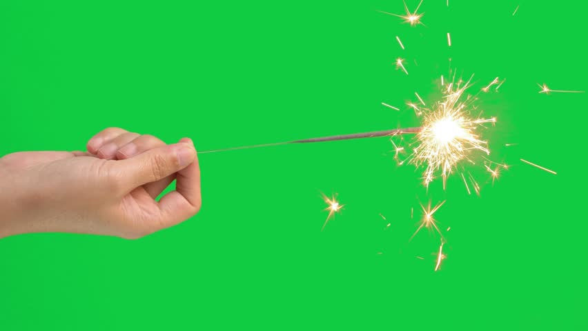 4K real sparkler. woman hand holding burning sparkler with swing hands slightly gesture, isolated on chroma key green screen background for overlay motion graphic. vertical Royalty-Free Stock Footage #1112093799