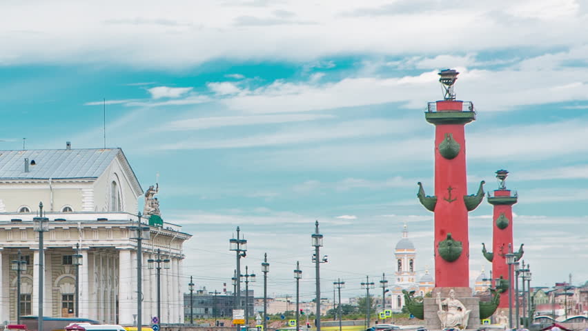 Timelapse of Cloudy Sky over Strelka - Spit of Vasilyevsky Island with Old Stock Exchange and Rostral Columns, Saint Petersburg, Russia