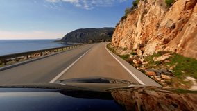 Driving car in the summer. Country side winding road with mountains and sea. 3840x2160 4k video footage
