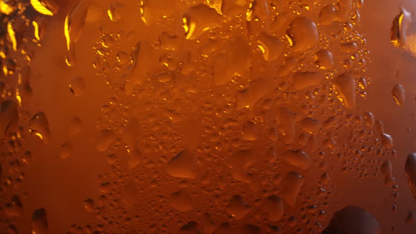 Close-up of beer bottles. Brown glass bottles filled with golden beer, embodying the essence of an alcoholic beverage, summer refreshment, and the spirit of Oktoberfest