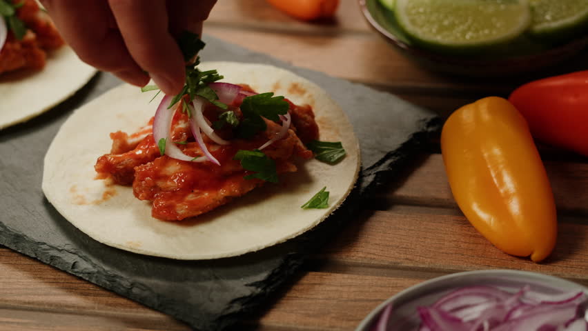 Traditional mexican food tacos with onion on the top close-up. Homemade tacos with meat and vegetables  | Shutterstock HD Video #1112120603