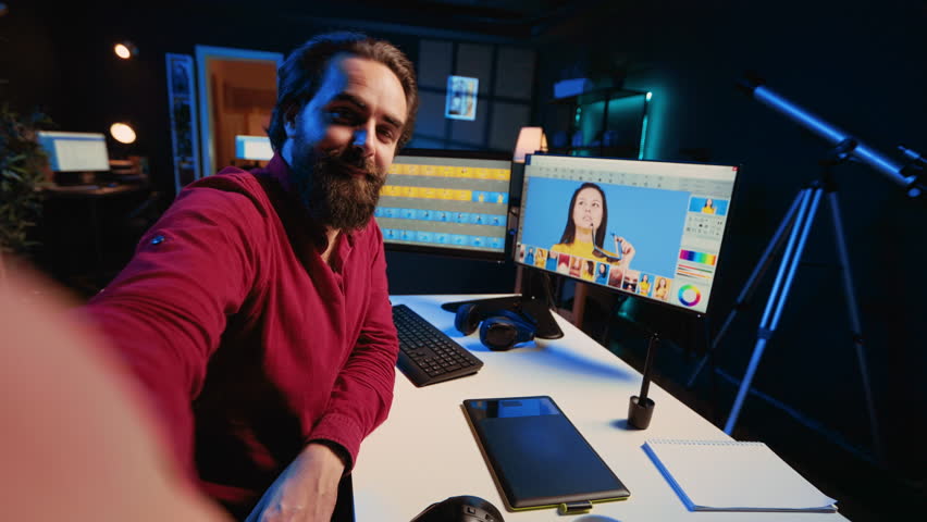 Videographer recording tutorial using smartphone selfie camera, talking about elevating video quality with skillful editing techniques. Influencer films post production guide with phone, POV shot