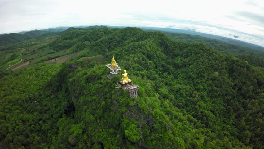 Aerial shot around Temple on mountain at phrae, Thailand.