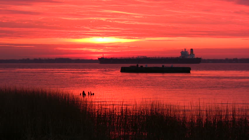 Ship on River at Sunrise.