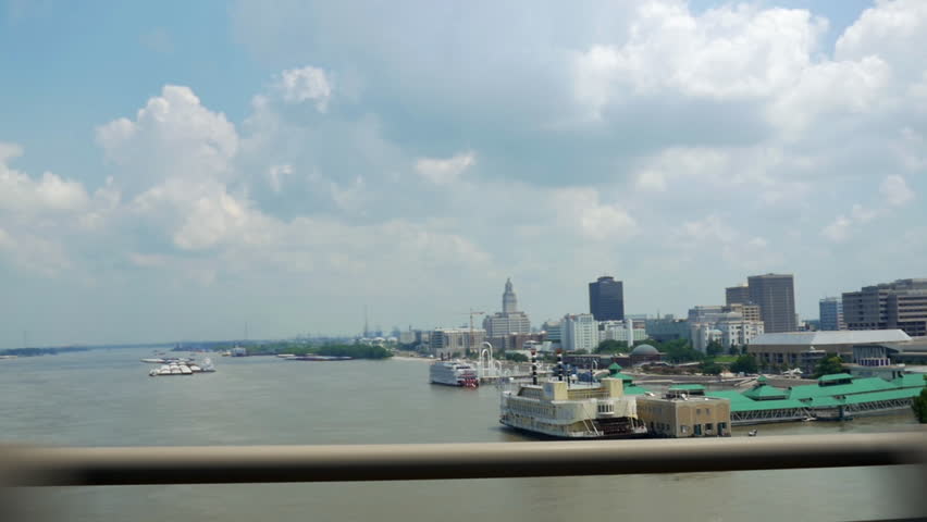 View of downtown Baton Rouge Louisiana as seen from bridge that crosses the Mississippi river.