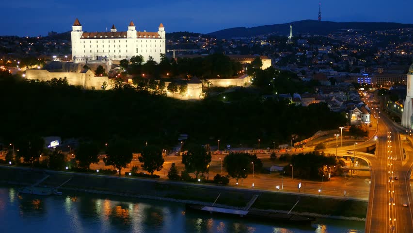 BRATISLAVA, SLOVAKIA - JULY 15, 2015: Night view of old castle and old town. Bratislava, Slovakia. UHD, 4K