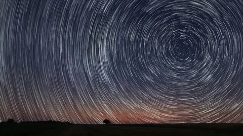 4K Star Trails Stunning Cosmos
Polaris North Star at center as earth rotates on axis. Beautiful Star Trails Time-lapse Stunning Cosmos. Beautiful night sky