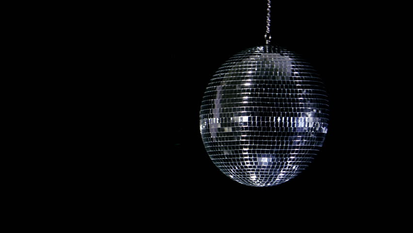 Disco ball with reflected moving rays. Anamorphic lens fare.