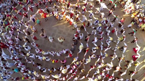 TULCEA, ROMANIA - AUGUST 08: Friendship dance (aerial view) at the International Folklore Festival on August 08, 2015 in Tulcea, Romania.