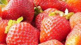 Fragaria ananassa fruit tasty red dessert background 4K 2160p UltraHD tilt footage - The garden strawberries fresh tasty fruit tilting 4K 3840X2160 30fps UHD video
