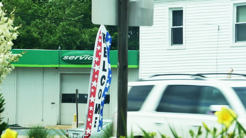 Welcome Flag Blowing in the Wind in Slow Motion