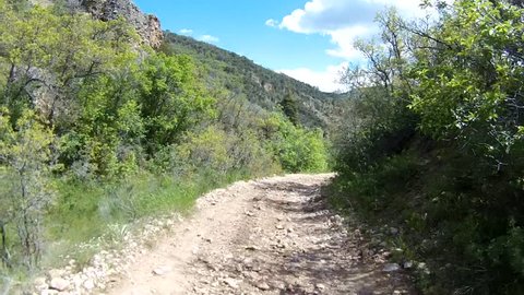 Off-road driving down a rocky cobblestone road. Filmed in Maple Canyon outside Fountain Green, UT.