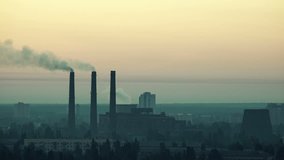 Time Lapse of Chimneys in Power Plant. Air Pollution Concept. 4K Ultra HD 3840x2160 Video Clip