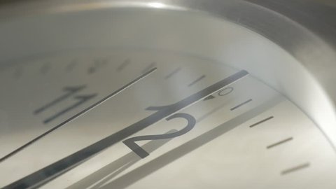 Analog clock needles slow motion moving to noon time close-up 1080p FullHD footage - Analog clock-face and needles slow-mo midnight time 1920X1080 HD video