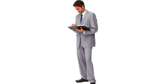 Elegant businessman taking notes isolated on a white background