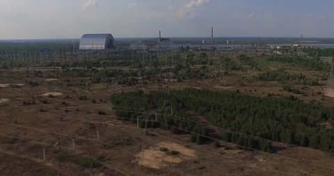 Chernobyl's arch. Aerial, 4K. The New Safe Confinement  is a structure intended to contain the nuclear reactor at Chernobyl, Ukraine, part of which was destroyed by the Chernobyl disaster in 1986. 