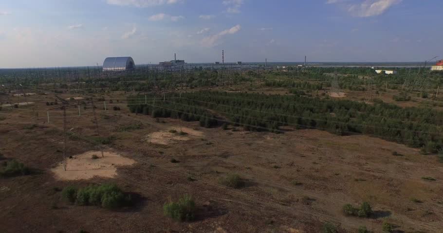 Chernobyl's arch. Aerial, 4K. The New Safe Confinement  is a structure intended to contain the nuclear reactor at Chernobyl, Ukraine, part of which was destroyed by the Chernobyl disaster in 1986.  Royalty-Free Stock Footage #11210711