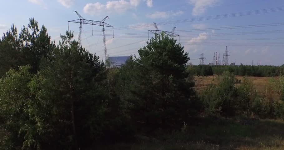 Chernobyl's arch. Aerial, 4K. The New Safe Confinement  is a structure intended to contain the nuclear reactor at Chernobyl, Ukraine, part of which was destroyed by the Chernobyl disaster in 1986.  Royalty-Free Stock Footage #11210717
