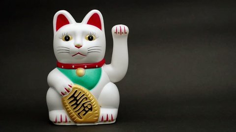 lucky or fortune cat waving for good business concepts.