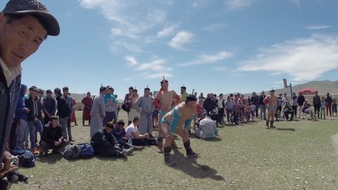 Tsagaannuur, mongolia - july 8 2015: Mongolian wrestling to celebrate the national holiday of Naadam, Tsagaanuur, Mongol?ya
July 8, 2015
a report from the beginning of the competition, where wrestlers are only heated under the blue sky