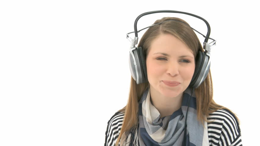 Beautiful woman listening to music with headphones