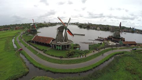 Zaandam Zaanse Schans aerial bird eye helicopter view of the windmills one of the most popular tourist attractions in Netherlands Holland exists of wooden windmills barns houses museum turning blades