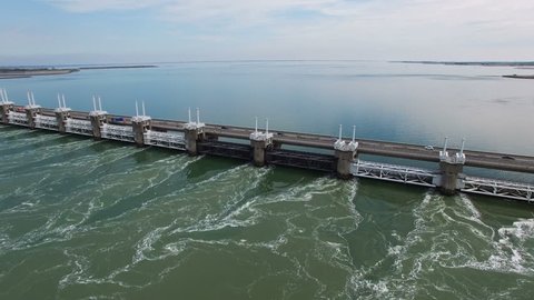 HQ Aerial Drone Video (Ultra HD) of the famous Dutch Delta Works. Seawater barriers engineered  for sea level protection. Camera: Steady height & view moving to the left.