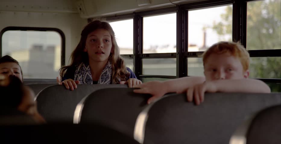 Kids on the school bus - friends on the way to class