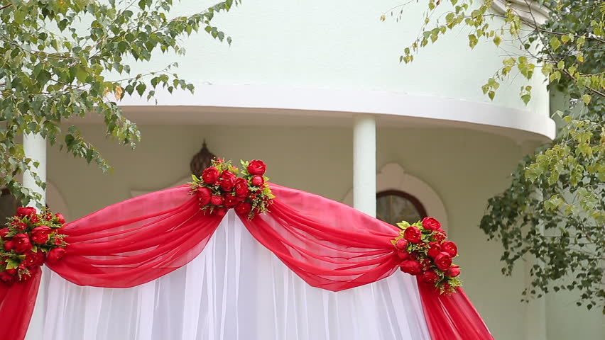 Wedding archway with flowers arranged in park for a wedding ceremony