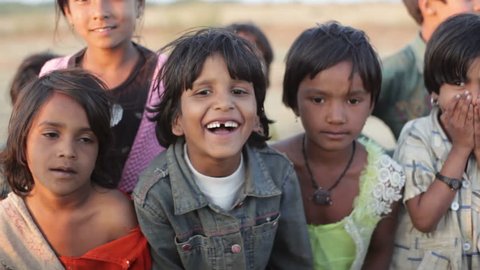 ANDHRA PRADESH, INDIA - CIRCA MAY 2013 - Happy laughing children, India, close up, shallow DOF