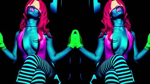 fantastic video of sexy cyber raver dancer babe filmed in fluorescent clothing under UV black light