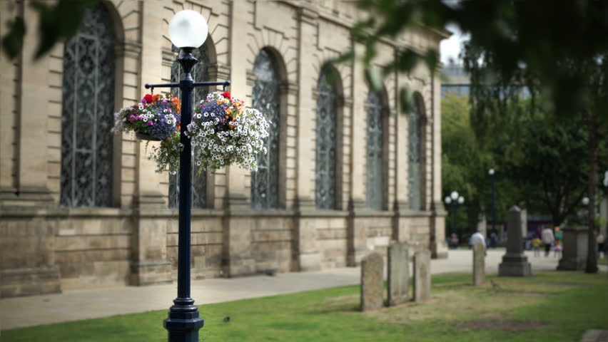 Hanging flower basket outside St Philip