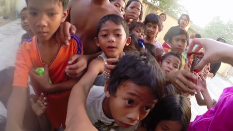 PHNOM PENH, CAMBODIA - JANUARY 2015: Charity donation to poor kids