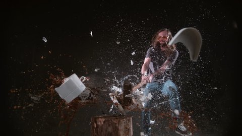 Man smashing coffee maker with hammer in slow motion, shot on Phantom Flex 4K at 1000 fps