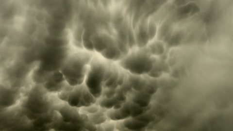 Menacing Mammatus. Look up as the anvil of a severe thunderstorm drifts overhead