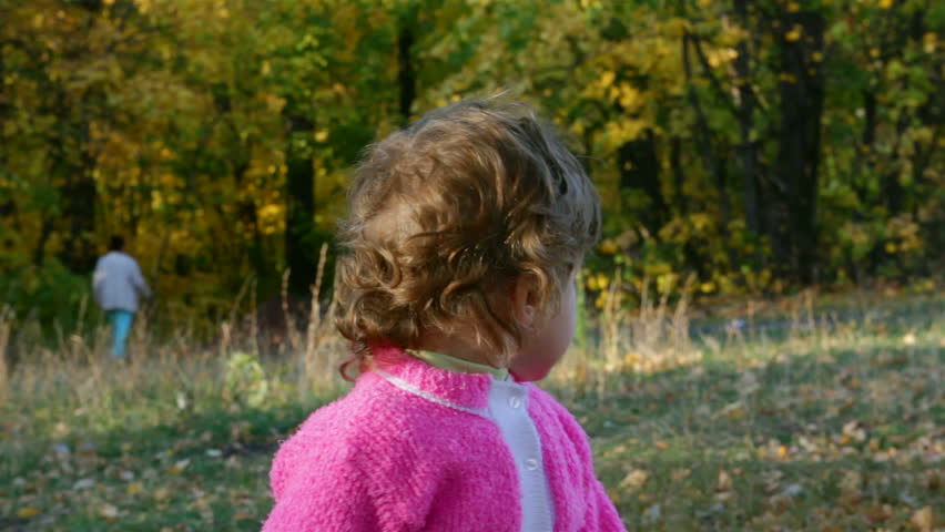 baby girl in autumn park