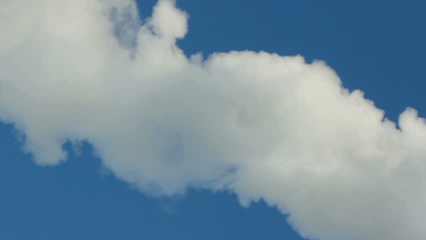 smoke from chimney under blue sky