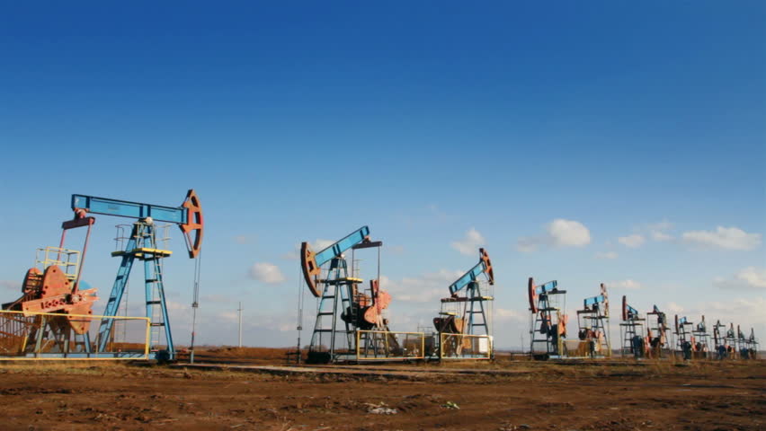 row of many working oil pumps - timelapse