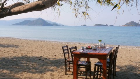 Turkish breakfast at beach by sea, fethiye, turkey